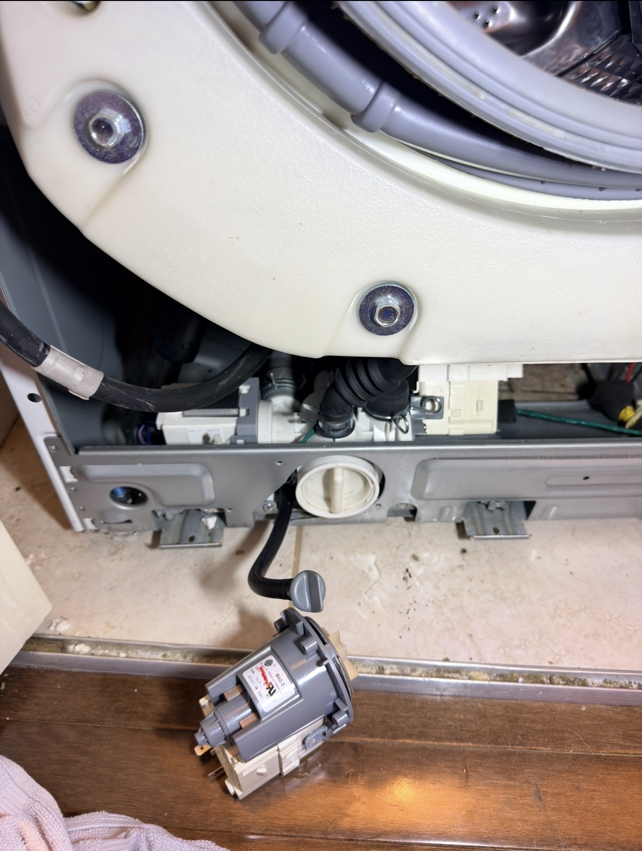 Samsung washer open pump removal in progress Premier Appliance Repair 10312
