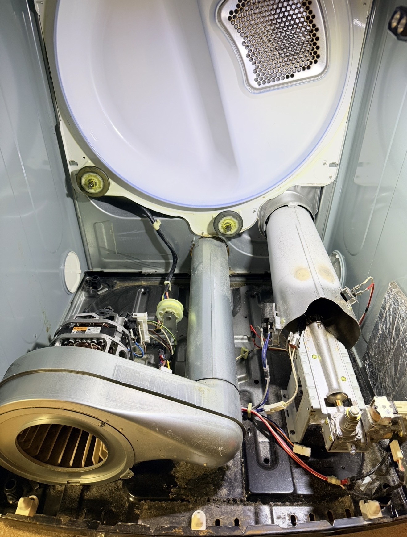 Samsung dryer internal components — heating assembly, drum roller and motor during repair Emerson Hill Staten Island