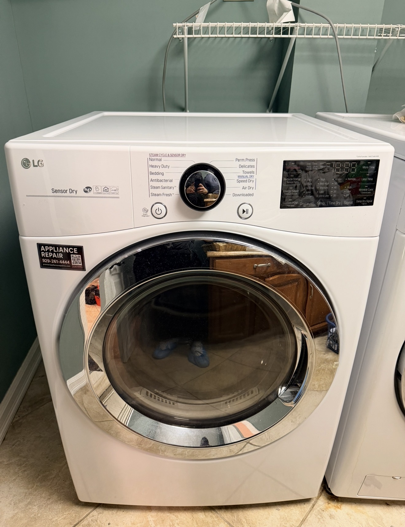 LG dryer internal view showing lint buildup around blower wheel and duct — d80 vent restriction cause in Great Kills 10308