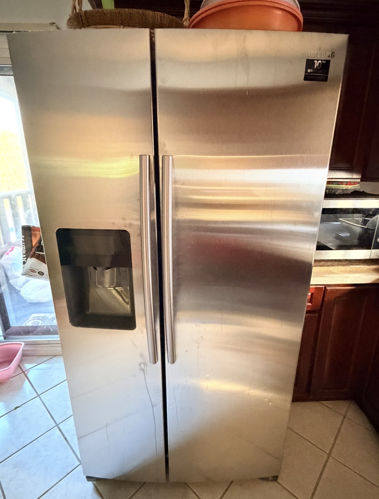 Badma Premier Appliance Repair Staten Island technician working on Samsung washer South Beach Arrochar Staten Island 10305